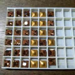 （79）SWAROVSKI 8mm LT.スモークトパーズ ゴ一ルド 36個