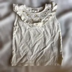 フリル付きクリーム色タンクトップ
