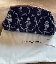 A VACATION クラッチバッグ