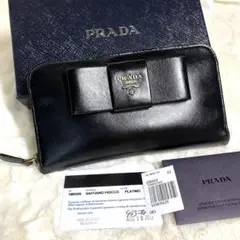 プラダ 財布 サフィアーノ リボン ラウンドファスナー 長財布 1M0506