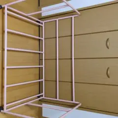 ピンク スチール製布団ラック