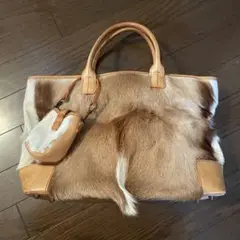 毛皮とレザーのハンドバッグ