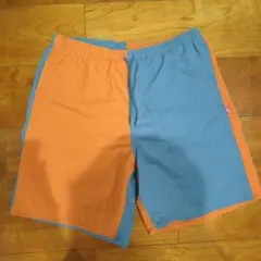 ナイロン製オレンジ/青ショートパンツ M
