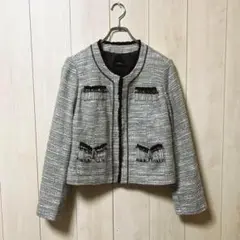 【美品】SUCRE ツイード　ノーカラージャケット　薄手〜普通　グレーa1461