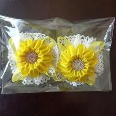 黄色の花モチーフと円形モチーフのヘアゴム2個セット