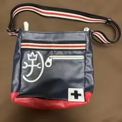 カステルバジックネイビーとレッドのショルダーバッグ