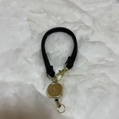 リール付きチャーム 黒 合成皮革