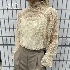 AIC. メッシュハイネックトップス