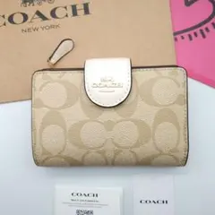 新作 新品 COACH 折り財布