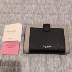 お値下げしました。未使用　kate spade 二つ折り財布 黒/ベージュ