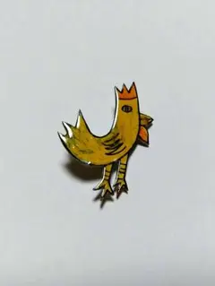 手描き風の黄色い鳥のブローチ