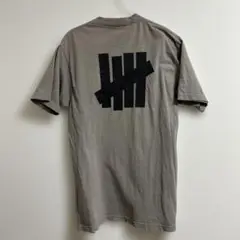 UNDEFEATED Tシャツ グレー　クルーネック　半袖Tシャツ USA製 S