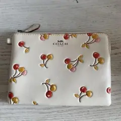 COACH さくらんぼ柄ポーチ