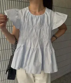 amiur シャーリングフレアトップス