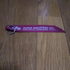 ALPHA INDUSTRIES レッド キーホルダー リボン ミリタリー