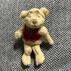 眼鏡をかけたベージュのクマのぬいぐるみ　アンティーク風