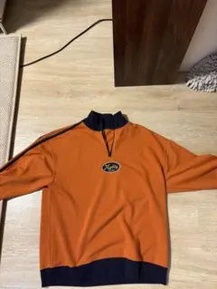 オレンジ ハーフジップ トレーナー