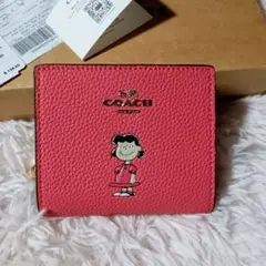 COACH x PEANUTS　スナップ ウォレット・ルーシー