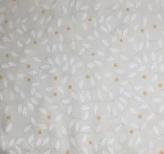 葉と蔓にオレンジの実 綿生地