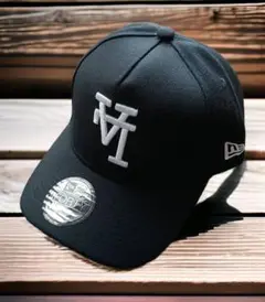 逆ロゴLA ブラック New Era スナップバック キャップ