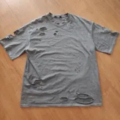 美品　.koM ドットケーオーエム　ダメージTシャツ