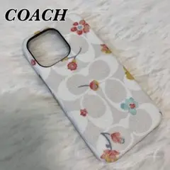 人気 未使用級 コーチ iPhone 13po ホワイト 花柄 スマホケース