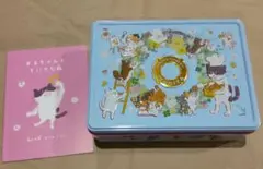 猫イラスト付きクッキーあき缶と小冊子