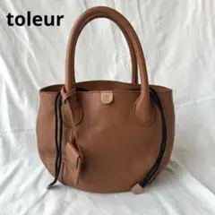 【美品・未使用】トーラ toleur 牛革カウレザー 巾着ミニトートバッグ