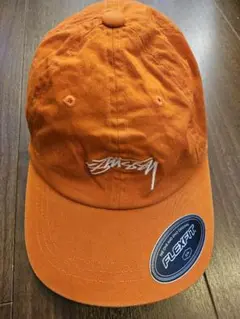 Stussy ステューシー　オレンジ FLEX FIT キャップ S/M