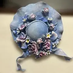 陶器花飾り付き青色ハット