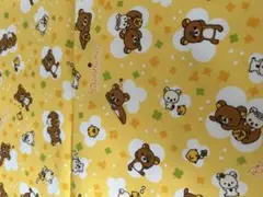 リラックマ プリント綿生地 イエロー