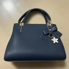 D.KELLY リボン付きハンドバッグ
