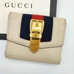 希少✨GUCCI シルヴィ シェリーライン 三つ折り財布 ベルト金具オフホワイト