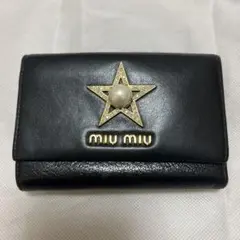 ミュウミュウ 折り財布 マドラス スタービジュー オールレザー 黒色