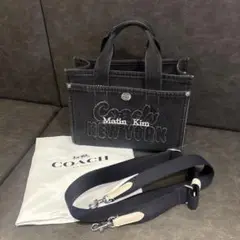 Coach Matin Kim デニム ジーンズ　ブラックM完売品 国内完売 MATIN KIM デニムバッグ LOGO WASHED DENIM DUFFEL BAG