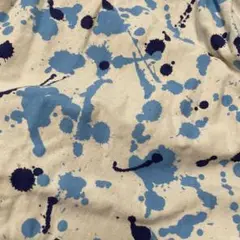 ニット生地SMILEペンキ模様