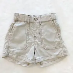 レノマ　ベージュ ハーフパンツ Rの刺繍付き