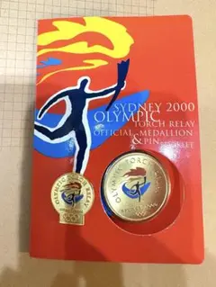 SYDNEY OLYMPIC MEDALLION & PIN BOOKLET