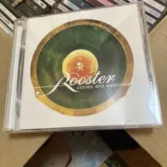 Rooster Circles and Satellites