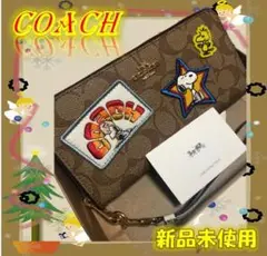 COACH x スヌーピー ストラップ付き長財布 PEANUTS
