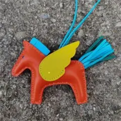 ペガサスバッグチャーム キーチェーン タッセルペンダント オレンジ イエロー