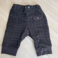 黒とグレーのチェック柄ボトムス