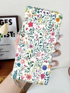 iphone16e対応 カラフルな花柄の手帳型ケース ストラップ付き