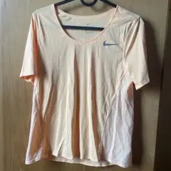 Nike オレンジ ショートスリーブ トップス
