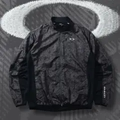 00s OAKLEY ナイロンジャケット 幾何学迷彩 異素材 刺繍ロゴ y2k