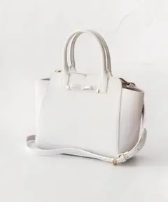 TOCCA TINY RIBBON LEATHER BAG