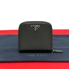 ほぼ未使用 プラダ 三角ロゴ サフィアーノ ラウンドジップ 二つ折り 折り財布