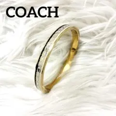 COACH コーチ　バングル　ブレスレット　ゴールド　ロゴ　アクセサリー
