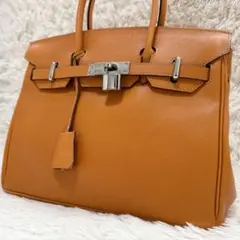 【美品】エムズグレイシー ハンドバッグ オレンジ シルバー金具 カデナ レザー