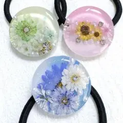 ⑨レジンヘアゴム。3個セット。スターフラワー。ひまわり。ノースポール。かすみ草。